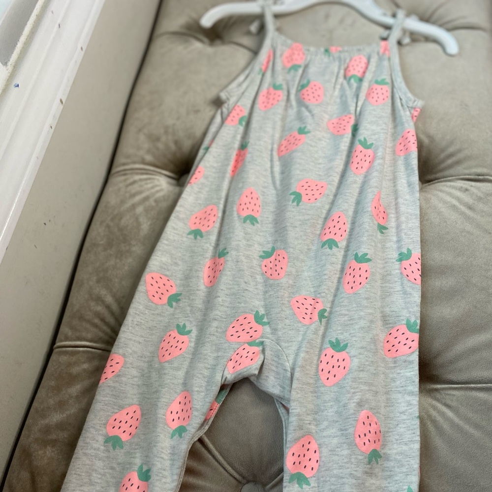 An adorable strawberry baby onesie!